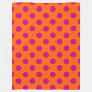 Fuchsia polka dots på orange fleecefilt