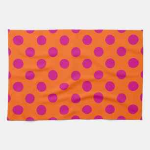 Fuchsia polka dots på orange kökshandduk