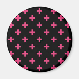 Fuchsia polka kor på svart magnet