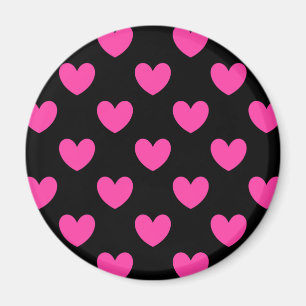 Fuchsia rosa polka-hjärtan på svart magnet