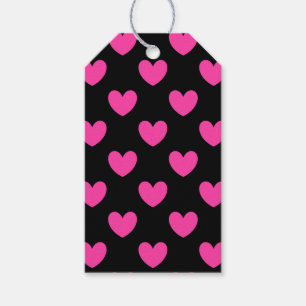 Fuchsia rosa polka-hjärtan på svart presentetikett