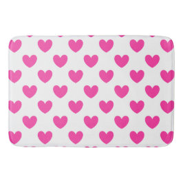 Fuchsia rosa polka-hjärtan på vita badrumsmatta