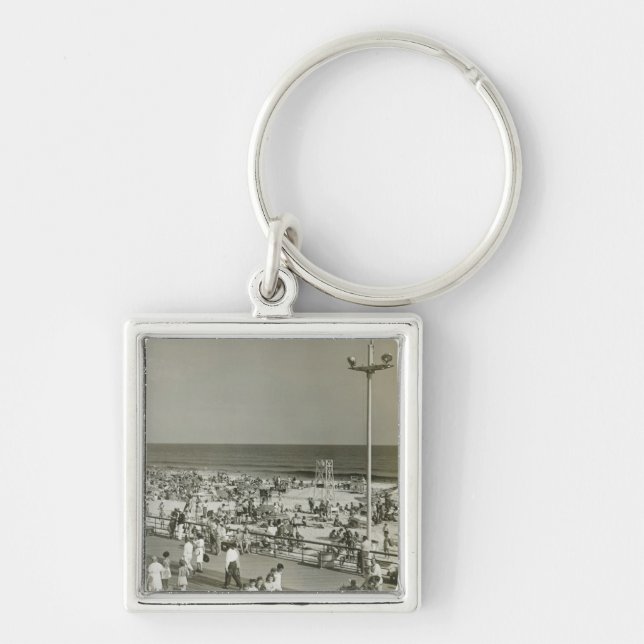 Fullsatt strand fyrkantig silverfärgad nyckelring (Framsidan)