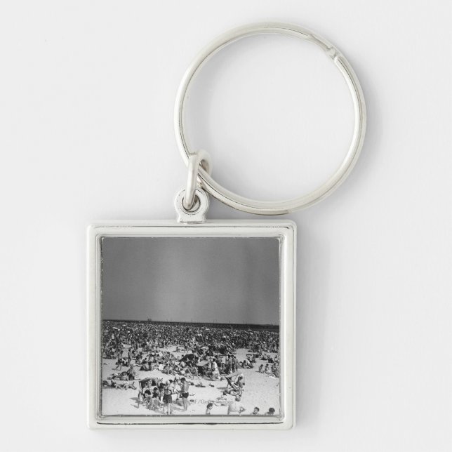 Fullsatt strand fyrkantig silverfärgad nyckelring (Framsidan)