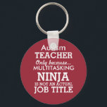 Funny Autism Special Needs Teacher Nyckelring<br><div class="desc">This funny key chain says Autism Teacher, only because Multitasking Ninja isn't an actual job title. This key chain can be personalized to say Special Needs Teacher, Down Syndrome Teacher, or even just a general Special Teacher. The background is red. You can change the color by clicking on Customize It....</div>