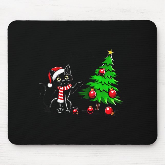 Funny Black Cat Pushing Christmas Tree Over Cat Wh Musmatta (Framsidan)