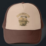Funny Cat Lover Pun Trucker Hat - Unique Gift  Keps<br><div class="desc">Show off your purr-sonality with our exclusive "Cattitude" Trucker Hat! Featuring an adorable cat nestled in a cup with a playful "Cattitude" graphic, this hat is the perfect accessory for anyone who loves felines and a good pun. Made with a breathable mesh back and a comfortable front panel, this stylish...</div>