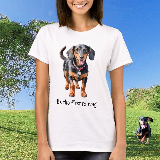 Funny Dachshund Dog Humor T Shirt (A cute t-shirt with dachshund picture in a watercolor style, and caption 'Be the first to wag')