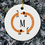 Funny Dachshund Sause Hund Monogram Julgransprydnad Keramik<br><div class="desc">Cute och lustig dachshund,  korv hundar eller hundar i evigt rörelse. Anpassa genom att ändra eller ta bort den ursprungliga versionen.</div>