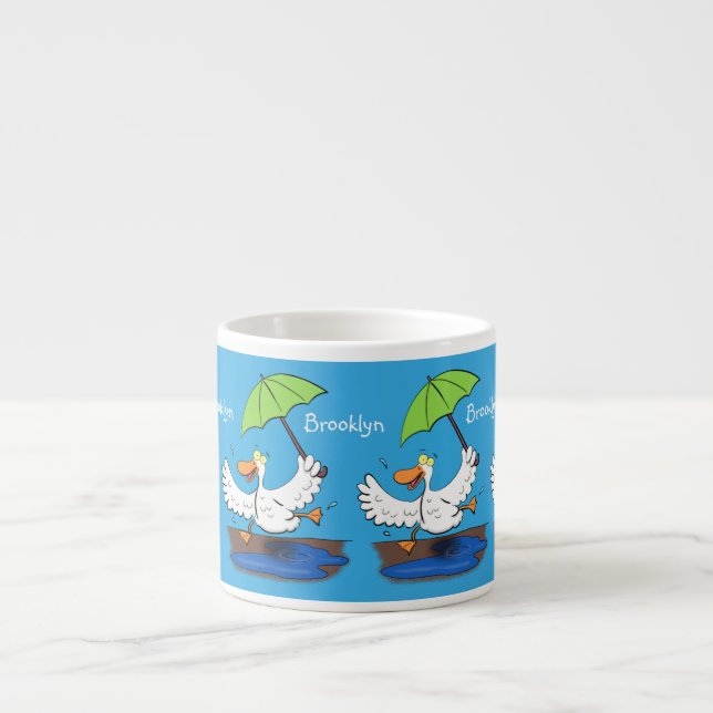 Funny duck with umbrella dancing cartoon espressomugg (Framsidan)