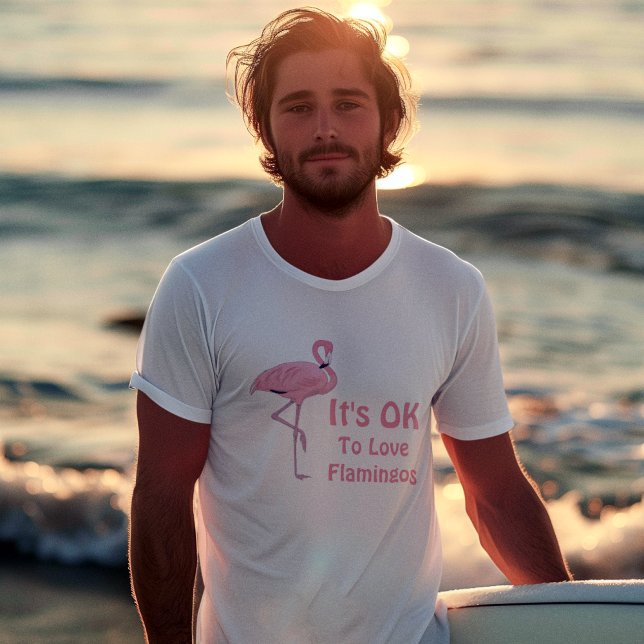 Funny Flamingo Älskare T Shirt (handsome young adult male surfer wearing it's ok to love flamingos tee shirt)