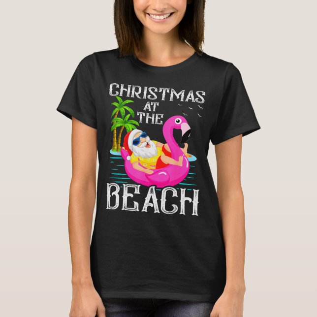 Funny Flamingo Float Santa Claus Christmas At The  T Shirt (Framsida)