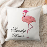 Funny Flamingo Jultomten Beach-jul Kudde<br><div class="desc">Lustigt Flamingo Jultomten Beach-noveltyn dekorativ kudde visar att rosa flamingo bär ett Jultomten-lock med namn Sandy Klo. Ett strandtema med helgdag hemdekanter accent biet med en känsla av humor. Baksidan är en solid matchande rosa. Perfekt för strandhus,  Floridians,  snöfåglar och flamingo älskare överallt.</div>