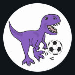 Funny Lila T-rex Dinosaur-uppspelningsfotbollsspel Runt Klistermärke<br><div class="desc">Det bästa för människor som kärlek dinosaurier,  fotboll och fotboll är att spela fotboll på lila T-rex dinosauauaur eller att spela fotboll.</div>
