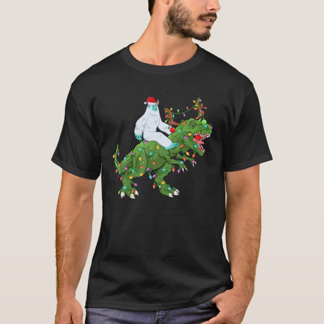 Funny Xmas Lights Santa Yeti Riding Dinosaur Trex T Shirt (Framsida)