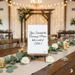 Funny "You Survived the Ceremony" Minimalist Weddi Bordsnummer<br><div class="desc">Add a touch of humor to your wedding reception with this witty table number card! Featuring the playful phrase "You Survived the Ceremony! Please take a seat at, " this minimalist design uses elegant black script calligraphy on a crisp white background. It's the perfect icebreaker for your guests. Easily personalize...</div>