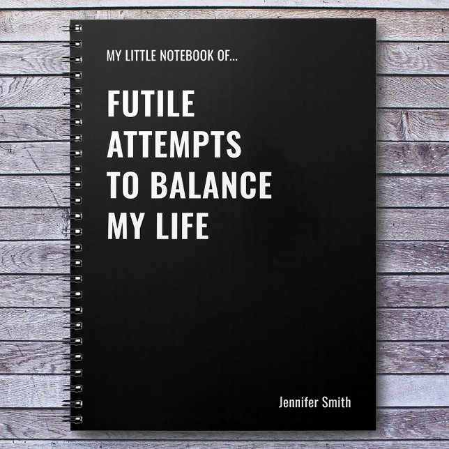 Futile-försök att balansera en funn offert anteckningsbok (Skapare uppladdad)