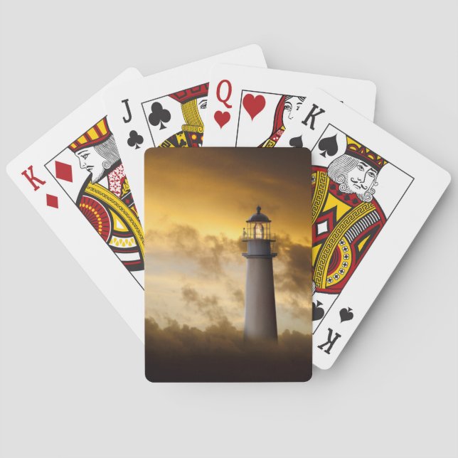 Fyr som glöder under dramatisk himmel casinokort (Baksidan)