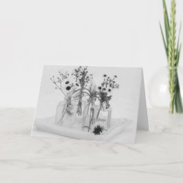 Fyra Flaskor och vita blommor Kort