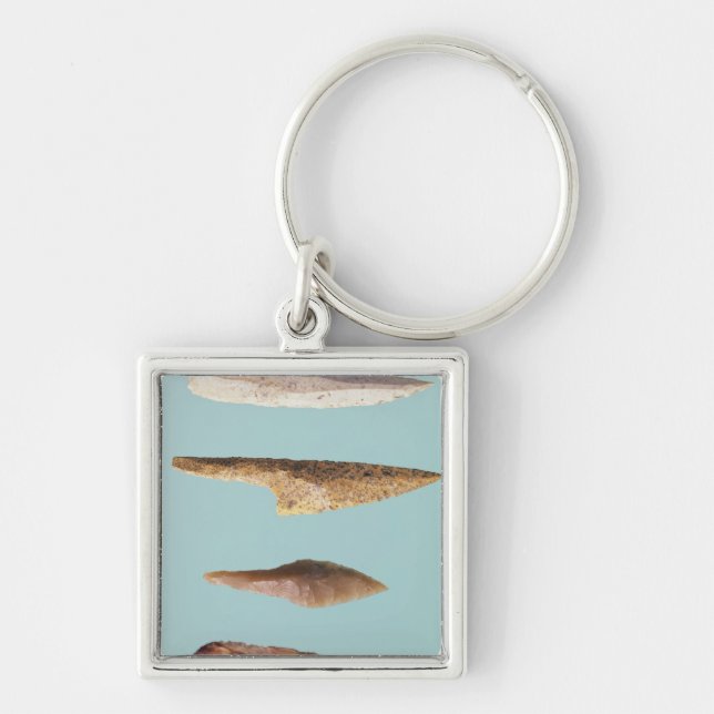 Fyra flintaverktyg fyrkantig silverfärgad nyckelring (Framsidan)