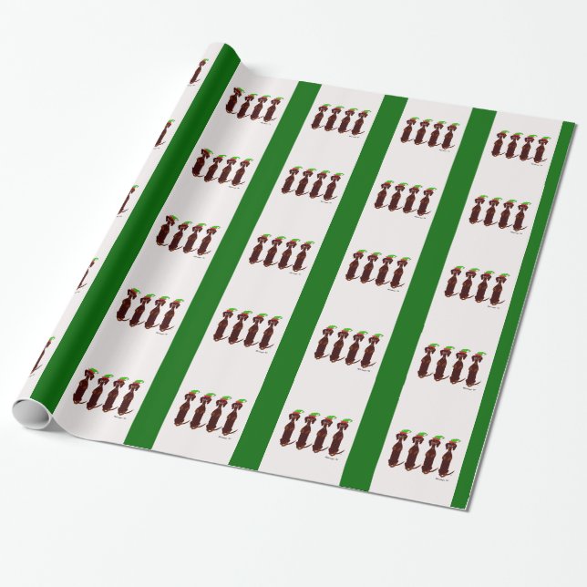 Fyra lite taxjul som slår in papper presentpapper (Utrullad)