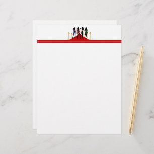 Fyra Mode-modeller som sitter på rödmattan