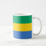 Gabon Flagga Ceramic Mugg<br><div class="desc">Fira Gabons pulserande kultur och naturskönhet med detta fantastiska Gabon Flagga Ceramic Mugg. Mugg är en perfekt som hyllar det gabonesiska flagga grönt, gult och blått vågrät och hyllar landets rik och nationella rand. Oavsett om du njuter av morgonkaffe, te eller någon hett dryck, tillför det här hållbara keramiska mugg...</div>
