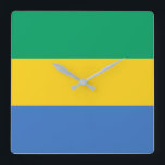 Gabon Flagga Fyrkantig Klocka<br><div class="desc">Gabons flagga är ett vågrät triband. Den använda färgen i flagga är blå,  grönt,  gult. Andelen Gabon flagga är 3:4. Gabons Flagga antogs 1960.</div>