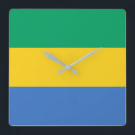 Gabon Flagga Fyrkantig Klocka<br><div class="desc">Gabons flagga är ett vågrät triband. Den använda färgen i flagga är blå,  grönt,  gult. Andelen Gabon flagga är 3:4. Gabons Flagga antogs 1960.</div>