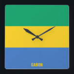 Gabon National Flagga Patriotic Fyrkantig Klocka<br><div class="desc">Gabons nationella Flagga Patriotic Square Wall Clock med flagga land i färg tryckt över hela tiden. Land namn är delvis integrerat i utformningen på grund. Anpassadet Text är fullt ut med funktionen "Anpassa den!". Den här charmerande utformningen är den häpnadsväckande presenten och den underbara show biet på väggen. © 2022...</div>