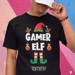 Gamer Elf-roligtens ironiska julfamiljeutrustning  T Shirt<br><div class="desc">Detta roliga självironiska spel-elf-t-shirt, som är en del av en passande familjeklädesplagg med gåvor till varje familjemedlem, kommer att hjälpa dig att komma in på helgdag. Perfekt för alla julfamiljeresammansamlingar har den här t-shirten en söt elf-hatt och roligt ben, med texten "Gamer elf" i ett modernt, vitt typsnitt. Skjortan är...</div>