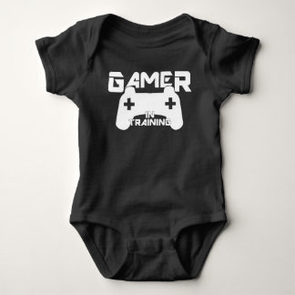 Gamer i utbildningsbabyen som är i ett stycke t shirt