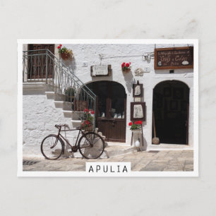 Gamla cyklar och storefront i Apulia Vykort