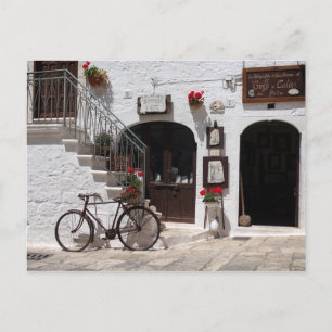 Gamla cyklar och storefront i Apulia Vykort