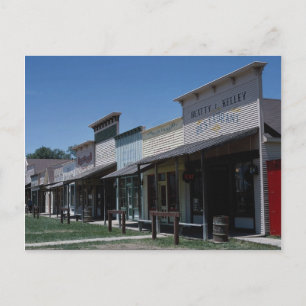 Gamla Dodge City storefronts i Dodge City, Kansas. Vykort