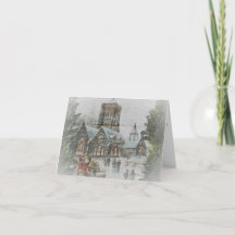 Gamla jultomten med barn framför en kyrka