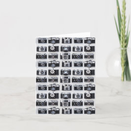 Gamla kamerainsamlarfotografer tomma insidan kort