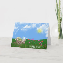 Gamla rullbarrow med blommor som tänker på dig kort