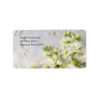 Gamla snöre med vita blommor adressetikett