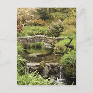 Gamla stenbron över en ström i Dartmoor Park Vykort