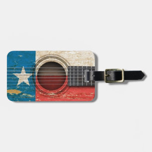 Gammal akustisk gitarr med den Texas flagga Bagagebricka