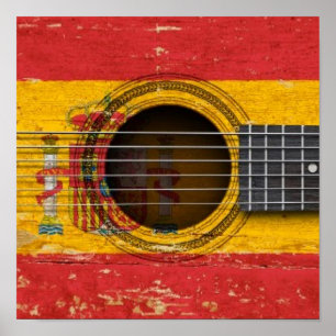 Gammal akustisk gitarr med spanjorflagga poster