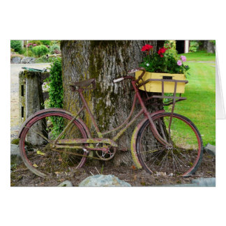 Gammal antikisk cykel med blomma Basket Hälsningskort