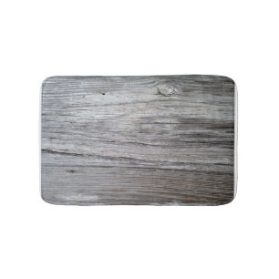 Gammal barnwood stiger ombord badmattan badrumsmatta