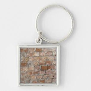 Gammal brickmur fyrkantig silverfärgad nyckelring