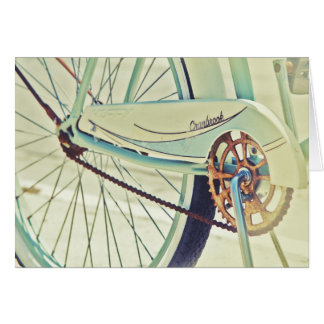 Gammal cykel på trottoaren hälsningskort