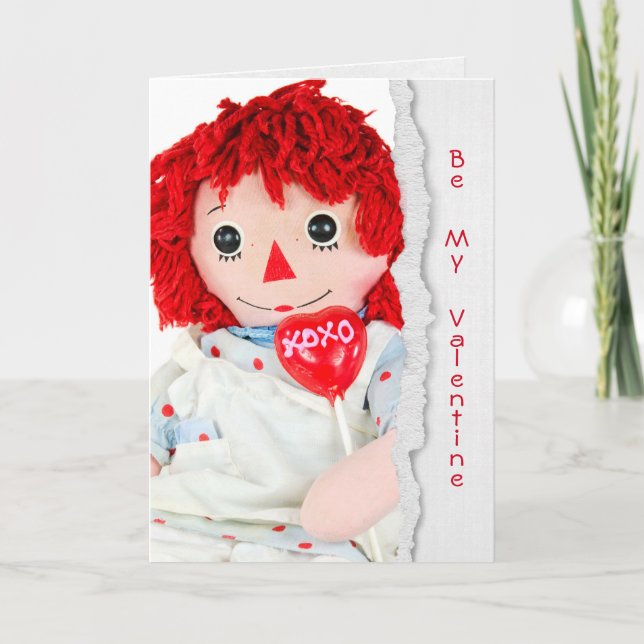 gammal docka med hjärtklappning av Valentine Kort (Framsida)