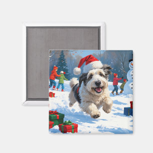 Gammal engelsk herdehund springer i snö julhatt magnet