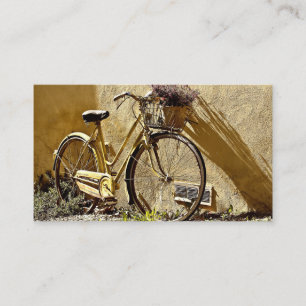 Gammal färgrik gul cykel visitkort