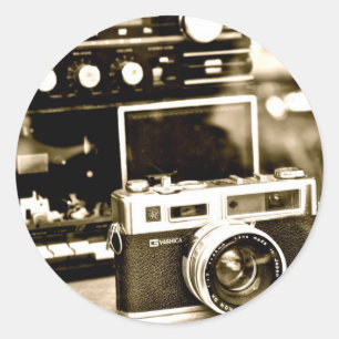 Gammal fotokamera runt klistermärke